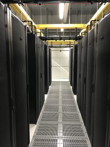 Rows of Server Cabinets in a Colocation Cage